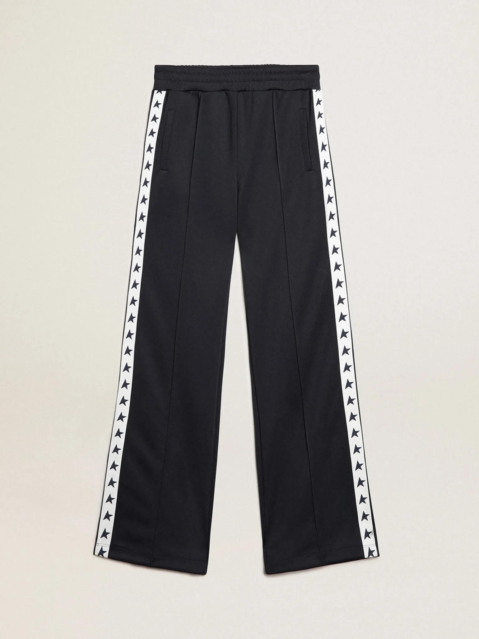 Online Calça de jogging azul-escura, fita branca e estrelas em contraste MULHER Jeans e calças