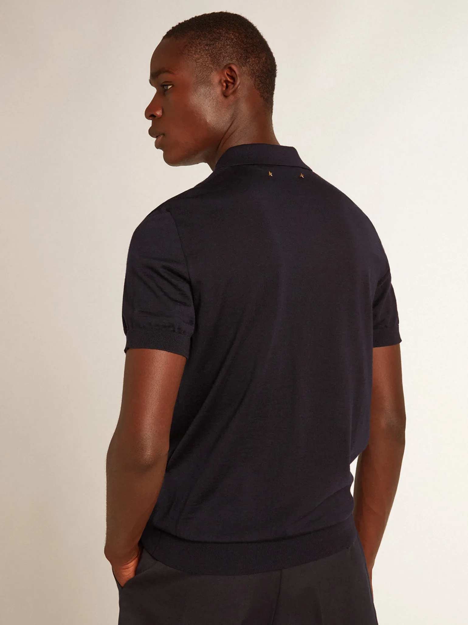 Store Polo masculina de manga curta de lã merino azul-marinho Camisetas