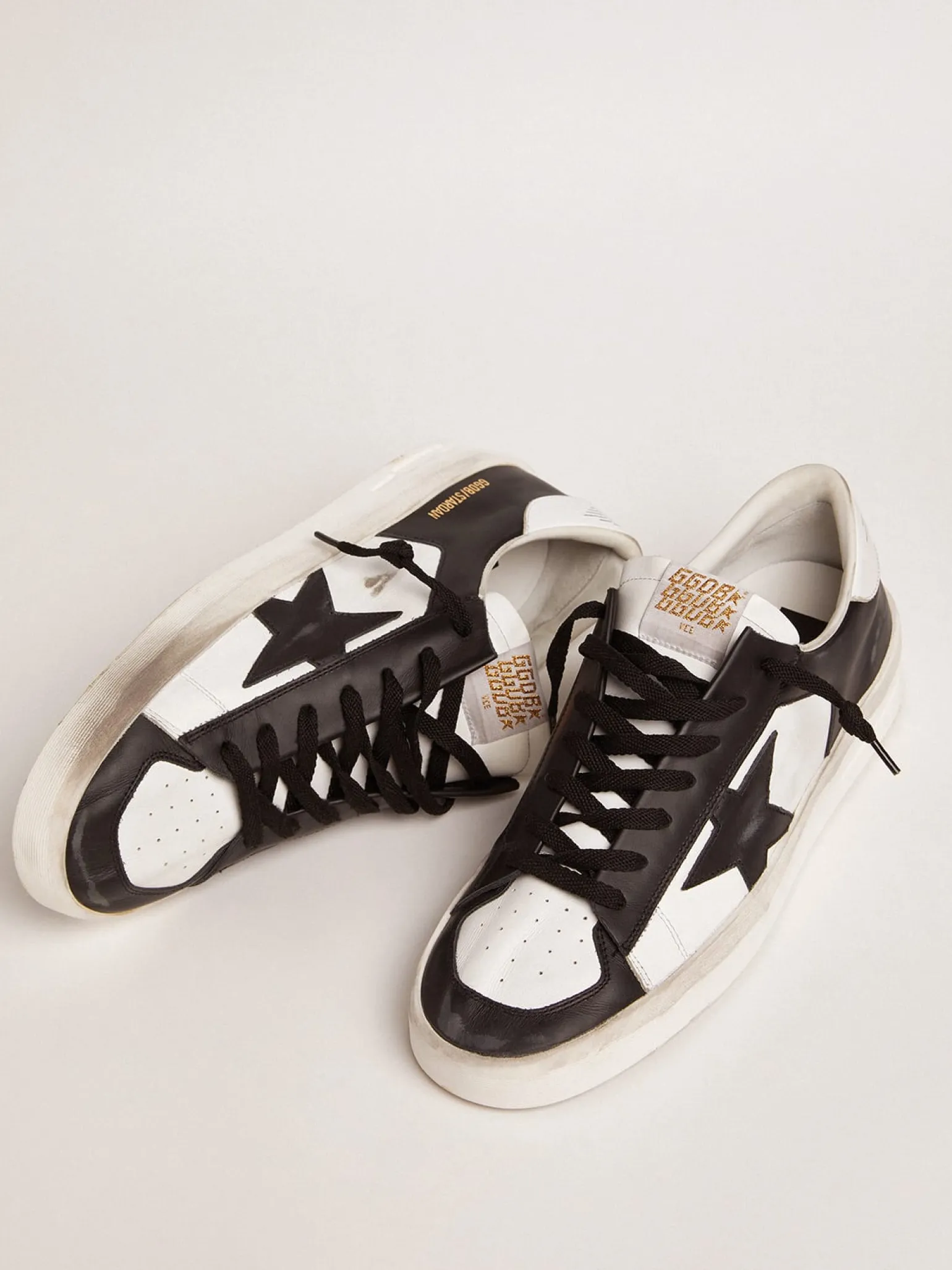 Online Stardan masculino de couro branco e preto Stardan