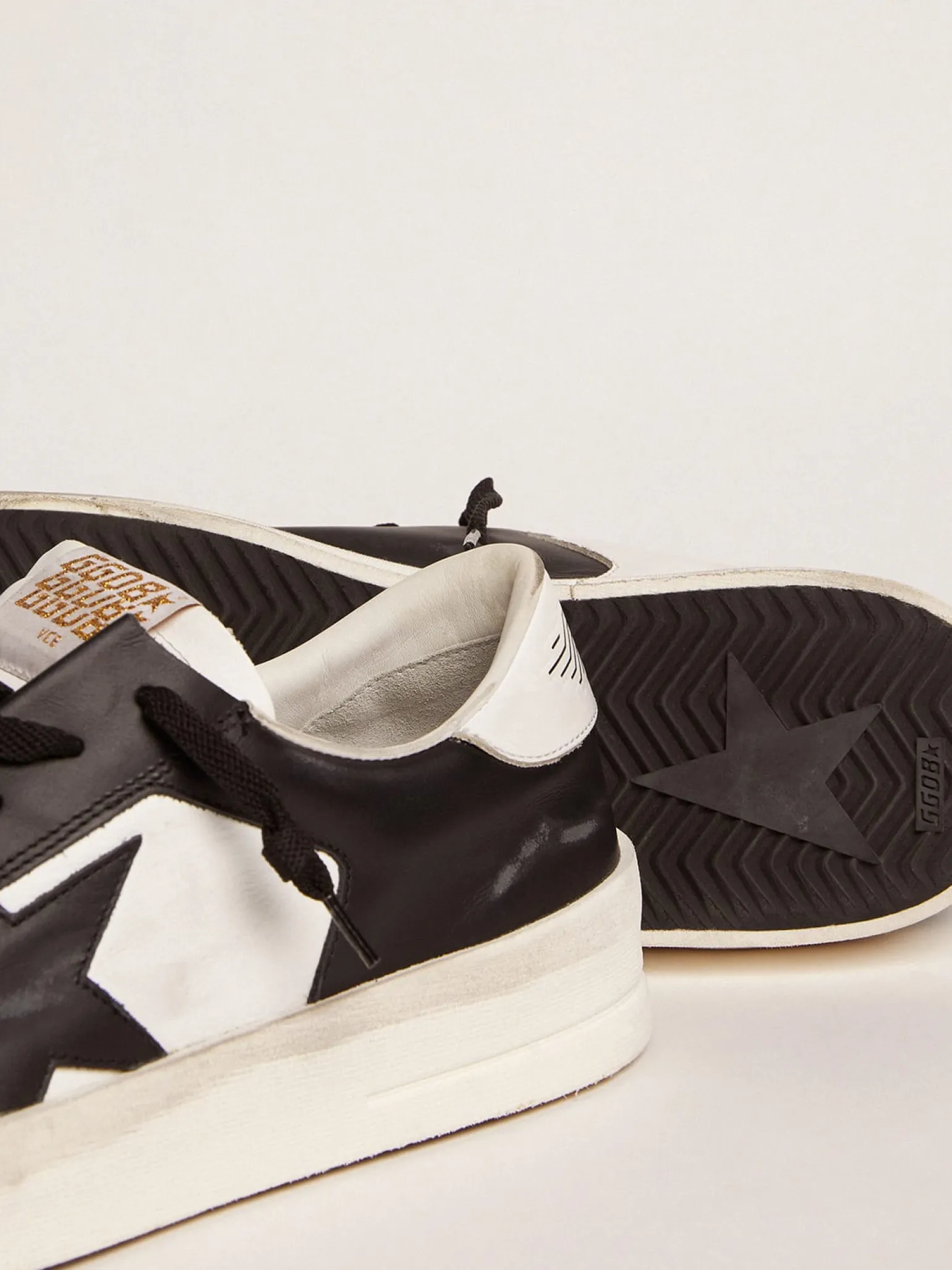 Online Stardan masculino de couro branco e preto Stardan